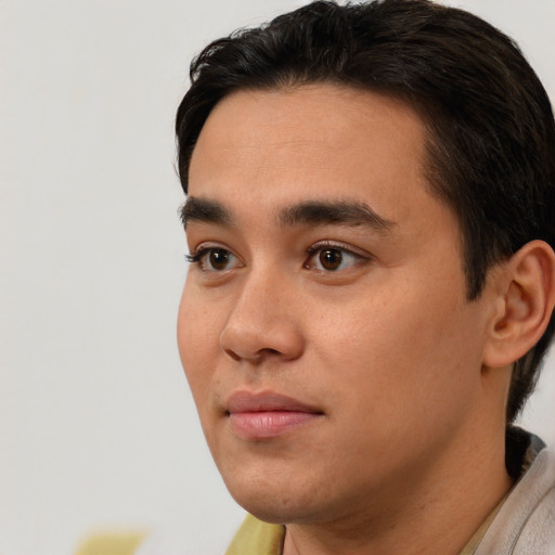 Neutral white young-adult male with short  black hair and brown eyes