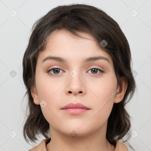 Neutral white young-adult female with medium  brown hair and brown eyes