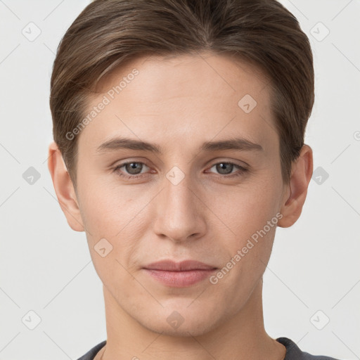 Joyful white young-adult female with short  brown hair and grey eyes