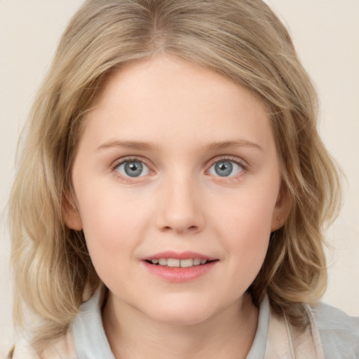 Joyful white child female with medium  brown hair and blue eyes