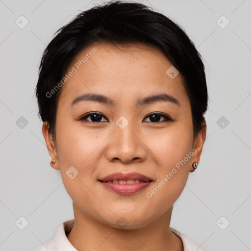 Joyful asian young-adult female with short  black hair and brown eyes