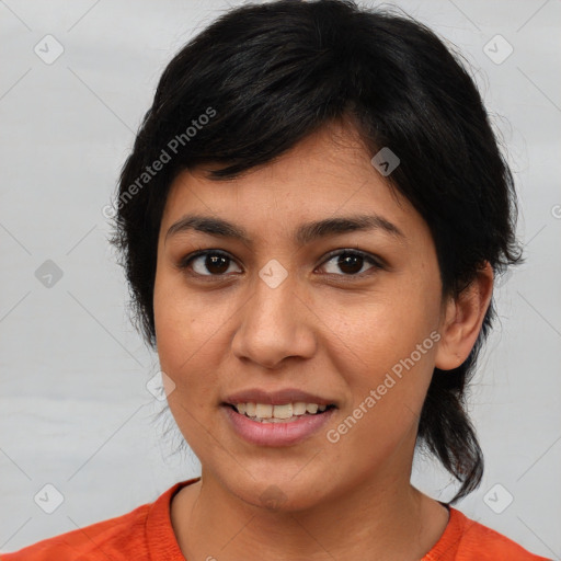 Joyful white young-adult female with medium  black hair and brown eyes