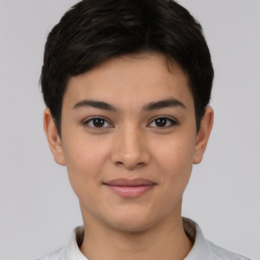 Joyful asian young-adult female with short  black hair and brown eyes