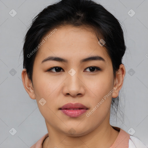 Joyful asian young-adult female with short  brown hair and brown eyes