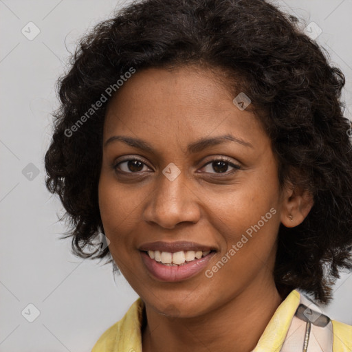 Joyful black young-adult female with medium  brown hair and brown eyes