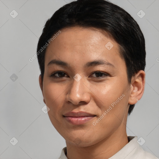 Joyful latino young-adult female with short  black hair and brown eyes