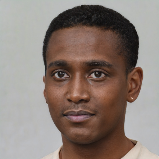 Neutral black young-adult male with short  black hair and brown eyes