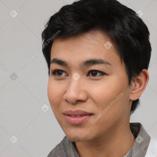 Joyful asian young-adult male with short  black hair and brown eyes