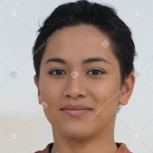 Joyful latino young-adult female with short  brown hair and brown eyes