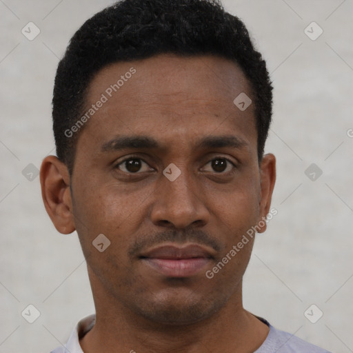 Neutral black young-adult male with short  brown hair and brown eyes