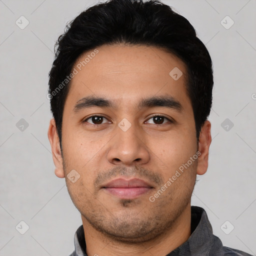 Neutral latino young-adult male with short  black hair and brown eyes