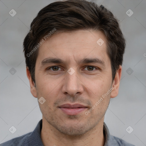 Joyful white adult male with short  brown hair and brown eyes