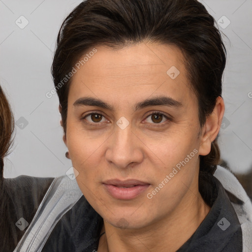 Joyful white young-adult female with medium  brown hair and brown eyes