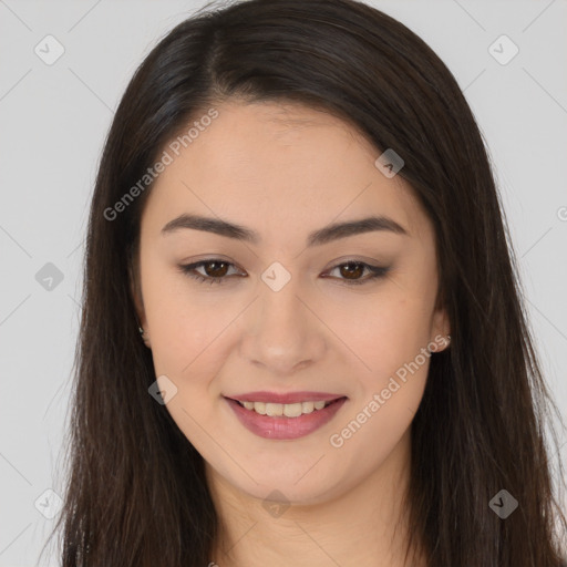 Joyful asian young-adult female with long  brown hair and brown eyes