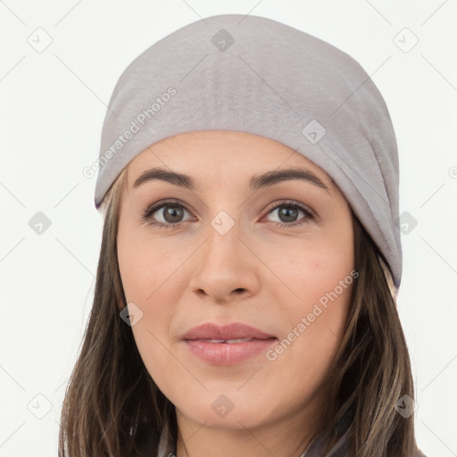 Joyful white young-adult female with long  black hair and brown eyes