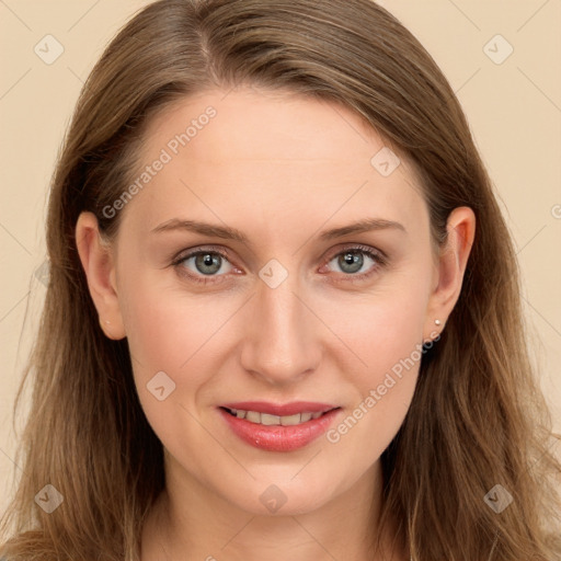 Joyful white young-adult female with long  brown hair and blue eyes