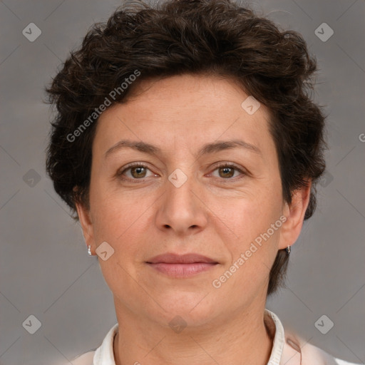 Joyful white adult female with short  brown hair and brown eyes