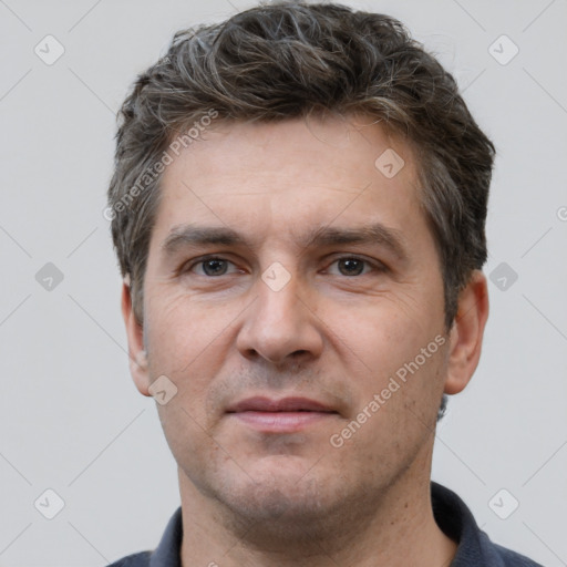 Neutral white adult male with short  brown hair and brown eyes