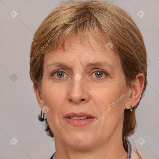 Joyful white adult female with medium  brown hair and grey eyes