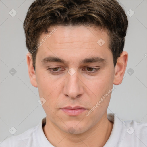 Neutral white young-adult male with short  brown hair and brown eyes