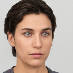 Neutral white young-adult female with short  brown hair and brown eyes