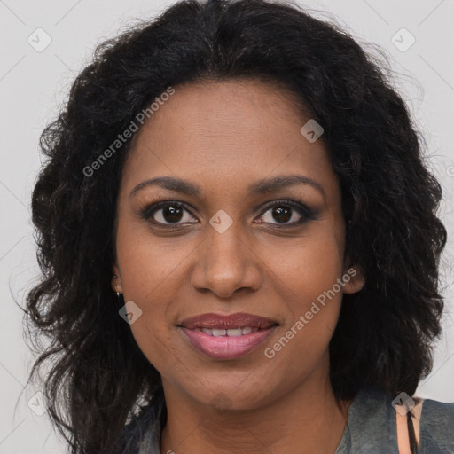 Joyful black young-adult female with long  brown hair and brown eyes