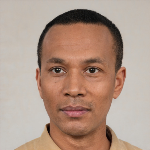 Neutral black adult male with short  black hair and brown eyes