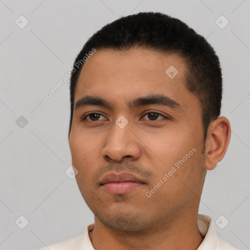 Neutral latino young-adult male with short  black hair and brown eyes