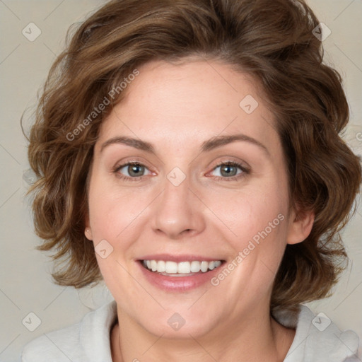 Joyful white young-adult female with medium  brown hair and blue eyes