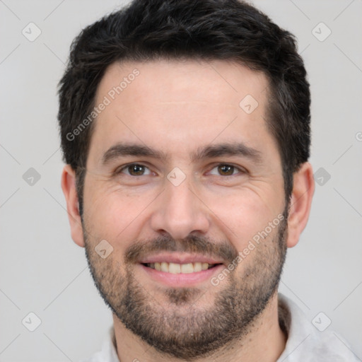 Joyful white young-adult male with short  black hair and brown eyes