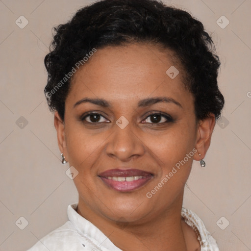 Joyful latino young-adult female with short  brown hair and brown eyes