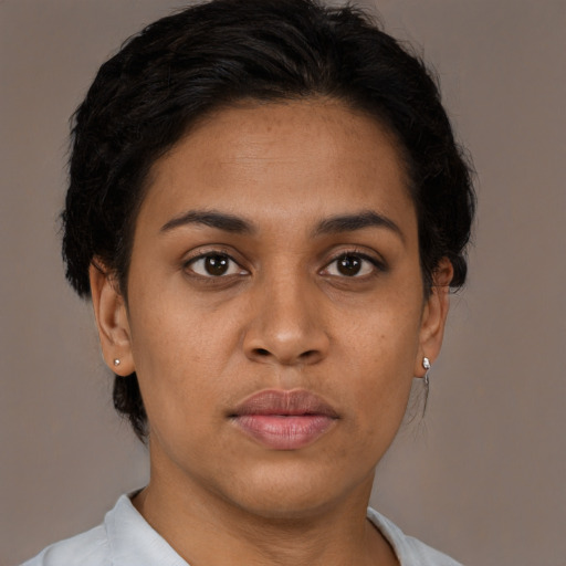 Neutral latino young-adult female with short  brown hair and brown eyes