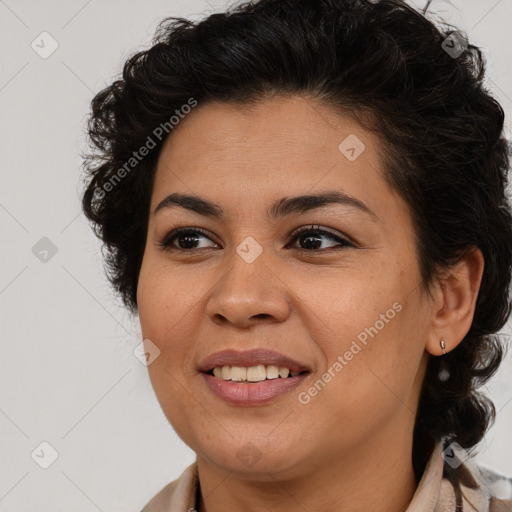 Joyful latino young-adult female with medium  brown hair and brown eyes