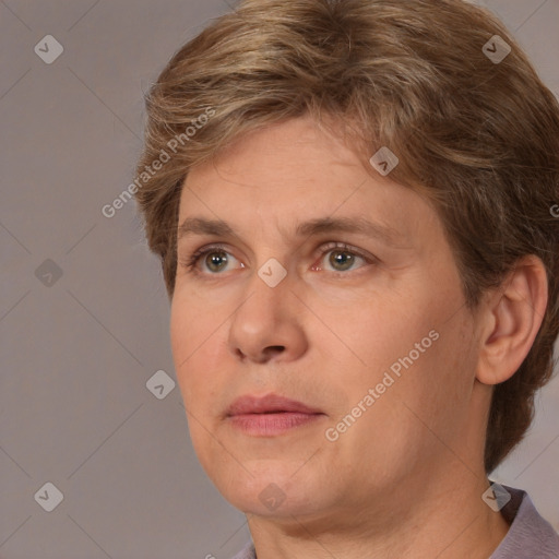 Joyful white adult female with short  brown hair and brown eyes