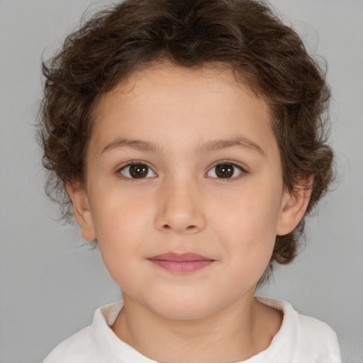 Joyful white child female with short  brown hair and brown eyes