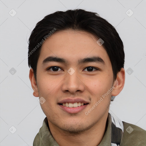 Joyful asian young-adult male with short  black hair and brown eyes