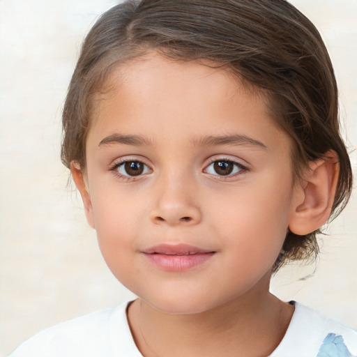 Joyful white child female with medium  brown hair and brown eyes