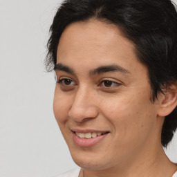 Joyful white young-adult male with medium  brown hair and brown eyes