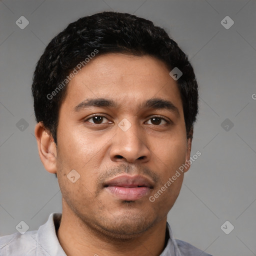 Neutral latino young-adult male with short  black hair and brown eyes
