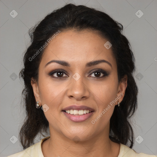 Joyful latino young-adult female with medium  brown hair and brown eyes