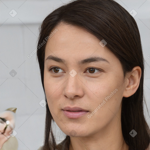 Neutral white young-adult female with long  brown hair and brown eyes