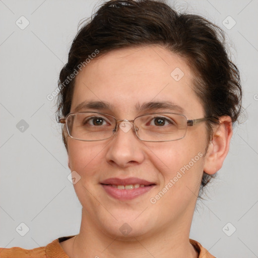 Joyful white adult female with short  brown hair and brown eyes