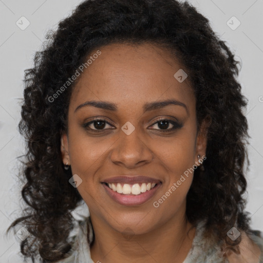 Joyful black young-adult female with medium  brown hair and brown eyes