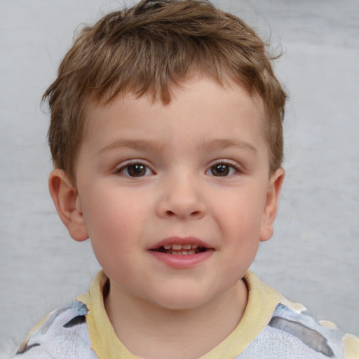 Joyful white child male with short  brown hair and brown eyes