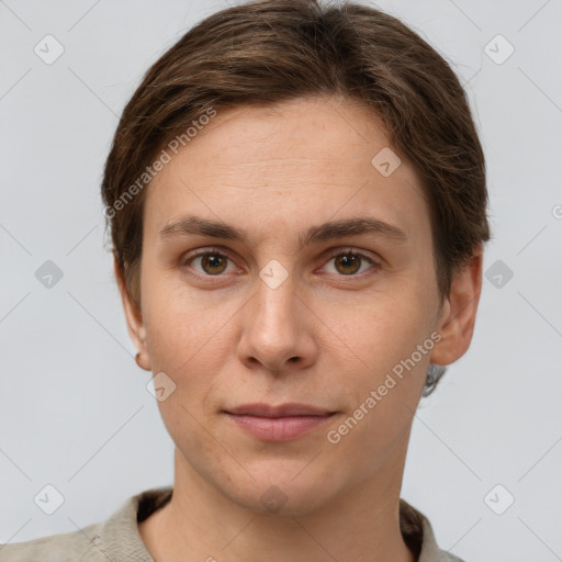 Joyful white young-adult female with short  brown hair and grey eyes