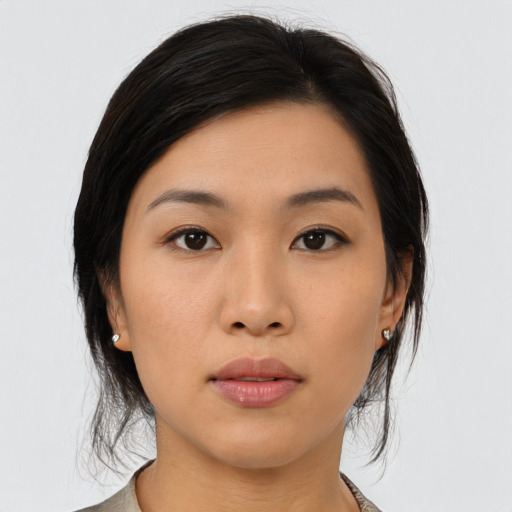 Neutral asian young-adult female with medium  black hair and brown eyes