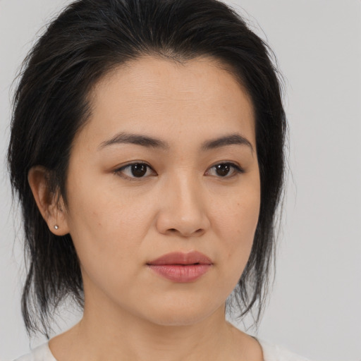 Neutral asian young-adult female with medium  brown hair and brown eyes