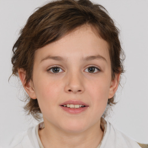 Joyful white child female with medium  brown hair and brown eyes