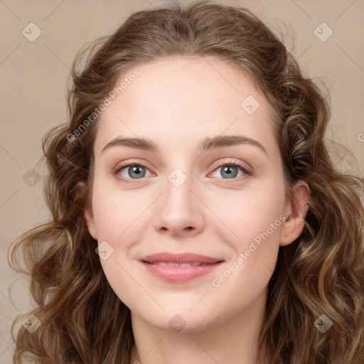 Joyful white young-adult female with long  brown hair and green eyes