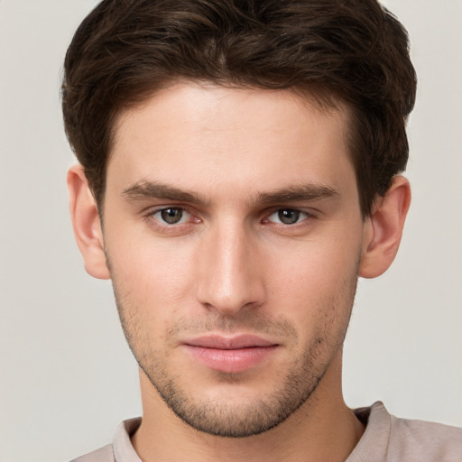 Neutral white young-adult male with short  brown hair and brown eyes